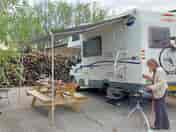 Hardstanding electric hook-up pitch suitable for motorhomes, caravans and long wheeled base vans.