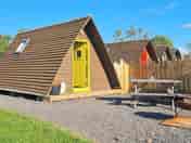 Yellow glamping pod.