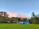 View looking up the hill to our tent from down the slope towards the shower block.
