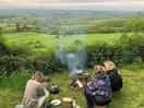 Cooking over the fire in the evening