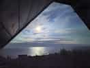 View from cabin over moonlit sea