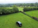 Mitsubishi delica in the campsite overlooking the countryside