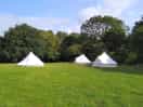 The field we stayed in had 3x fixed tents with a separate area for people pitching their own