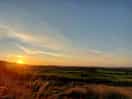 View of a sunset in july on a calm sunny evening