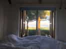 Het mooie uitzicht vanuit je eigen bed.