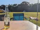 Relaxing with a beer bought on-site