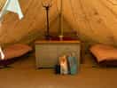 Inside the tent, double bed and two singles