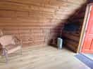 Bare room of 1 chair only, no sofa