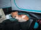 Pupper uimhir a dó loved their first time camping.