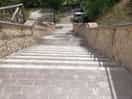 Steps down to another level