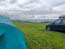 View of tent on upper pitches looking towards the gower