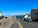 10/15 minute walk to the beach. chippy, indian and tesco all in 5 minute walk