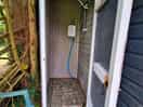One of the two shower cubicles. light on the door does not work so is pitch black when door closed.