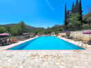 A clean and relaxing pool area. the water is perfect and a side booth to purchase something to drink