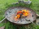 Toasting marshmallows at the communal fire pit.
