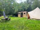 Secluded bell tent with hot tub and kitchen area