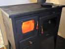 Log burner/cooker in shepherds hut