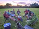 Our group eating pizza at sunset!