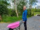 Lovely pink wheelbarrows for transporting your kit to your pitch.