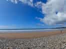 Newgale beach is lovely! walk round towards the caves wind drops and great caves!!!