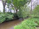 Small river alongside tourer/tent site