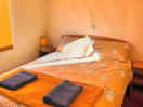 Cosy bedroom with towels