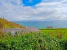 View out to see with hut from broadchurch infront