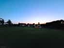 Sunset over the farmhouse and cottage