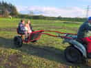 The owner let the kids have a ride around the site, this made their day