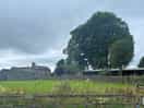 View of the farmhouse from the site
