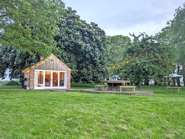 The Old Forge - Double Door Entrance and Hexagonal Tree Picnic Table.