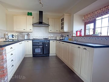 Fully fitted kitchen in holiday cottages.