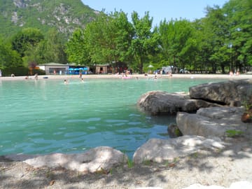 The pond and its beach are a short walk away