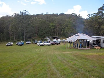 Having a few beers around the covered campfire