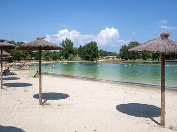 The beach and a peaceful spot under the parasol