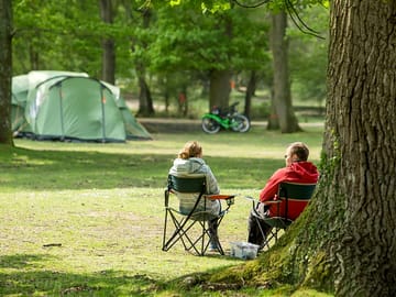 Couple relaxing at hollands wood