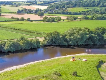 Pitches by the river