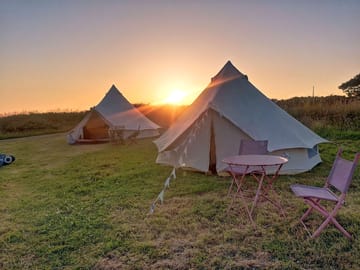 Bell tents at sunset
