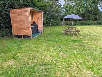 Camp kitchen and picnic bench