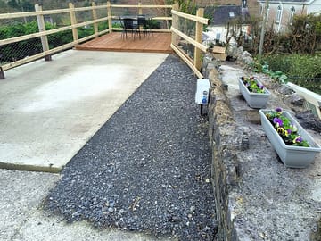 Pitch with decking and seating ready for guests