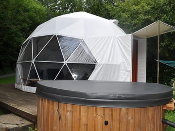 View of the geodome and wood fired hot tub