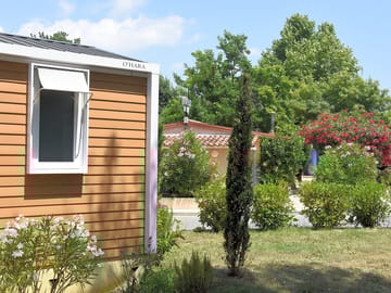 Green spaces are around the whole site