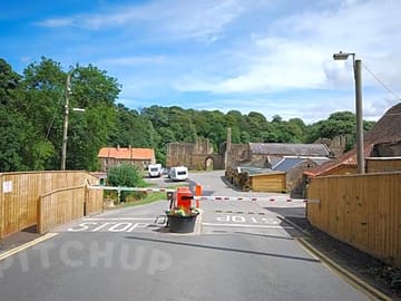 Park entrance and security barrier.