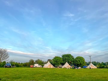 Field with bell tents