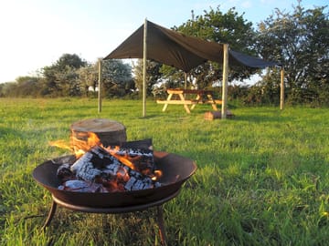 The bell tent pitches offer fire pits and picnic benches