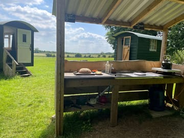Simple outdoor kitchen with gas hob or cook on the fire