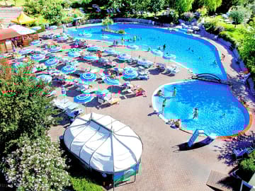 View over the swimming pool, paddling pool and sun terrace
