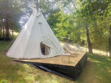Tipi on a wooden deck