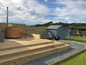 Firepit, barbecue, hot tub and play area