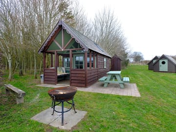 The cabin lends itself to camping holidays with lots of outdoor eating and fires in the firebowl!